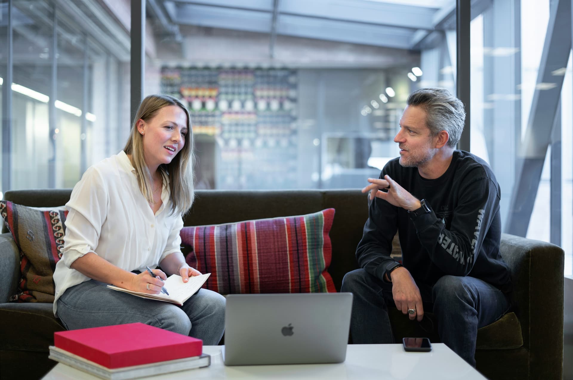 A training provider reviewing digital skills evidence on a laptop
